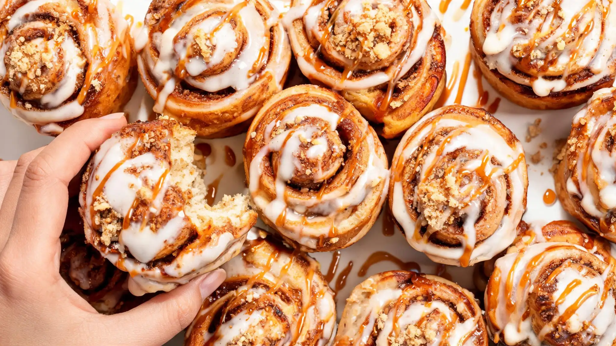 Assorted cinnamon roll desserts: bites and cups ready to bake