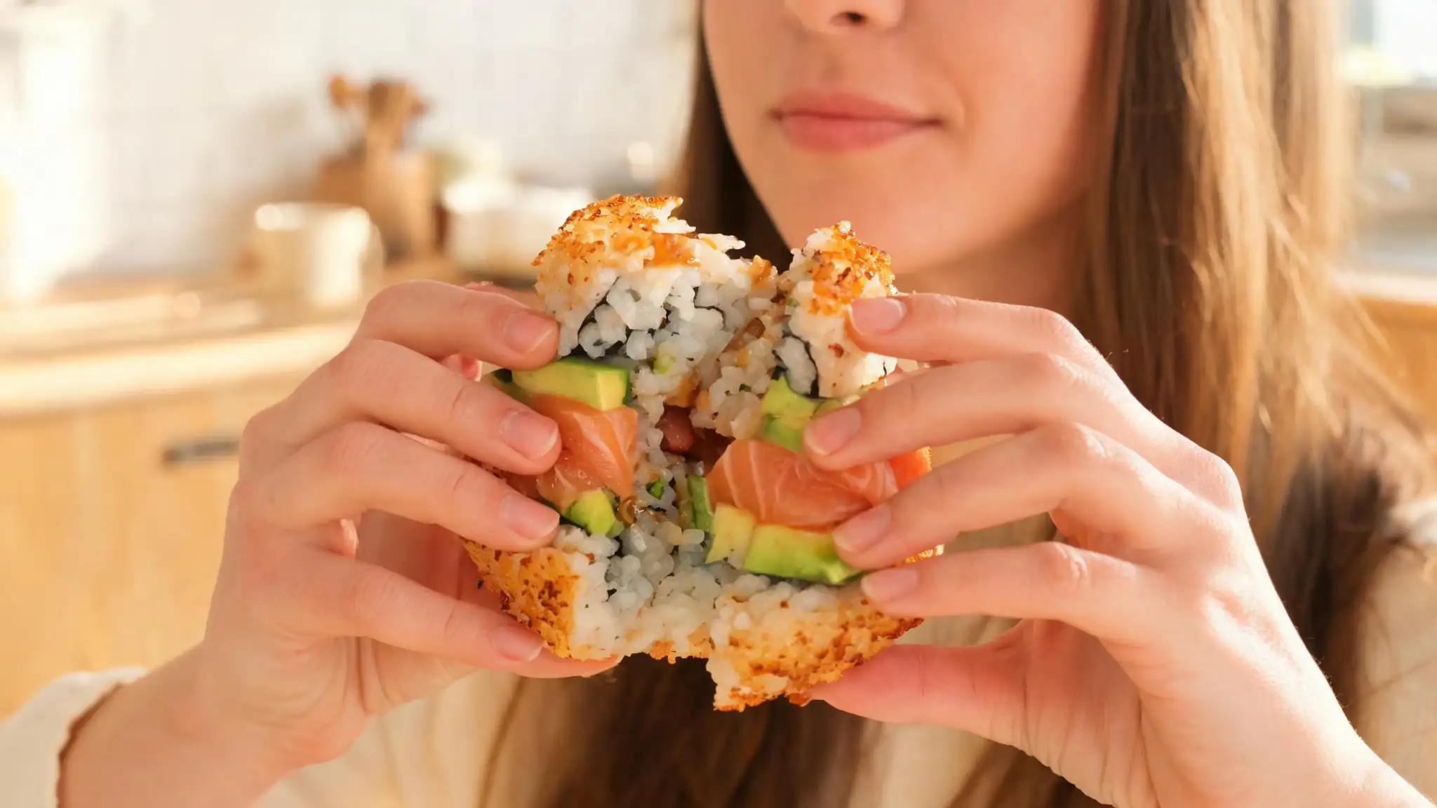 Step-by-step assembly of a homemade sushi burger with crispy rice buns and nori collar